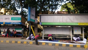 Advertising on Bus Shelter in Minvera Circle, Bengaluru