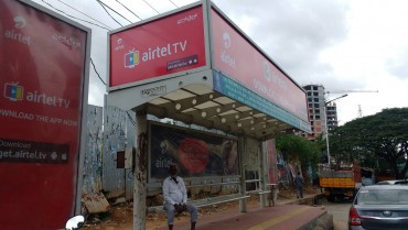 Advertising on Bus Shelter in Lalbagh Road, Bengaluru